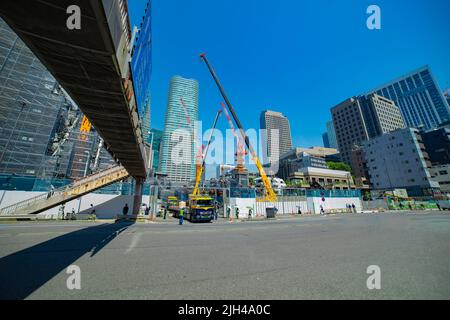 Cranes at the under construction in Tokyo wide shot Stock Photo