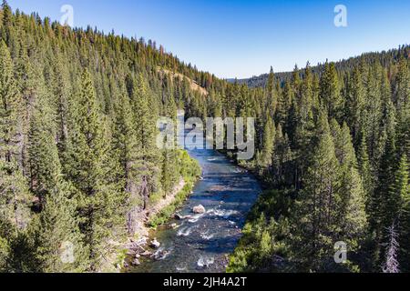 Wild river flows through California wilderness near Lake Tahoe Truckee. Stock Photo