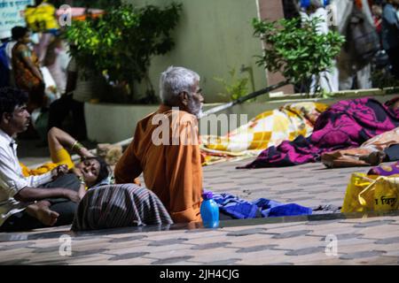 old man sleeping on road, family, homeless Stock Photo