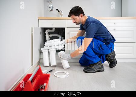 Water Purification Filter Install And Maintenance Service Stock Photo