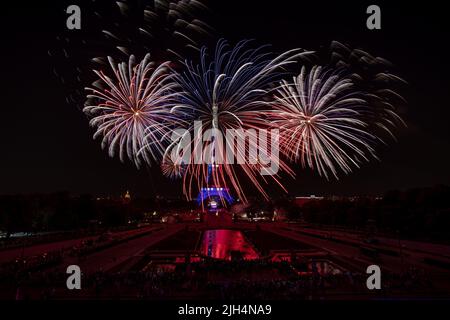Paris, France. 14th July, 2022. Fireworks explode near the Eiffel Tower during the Bastille Day celebrations in Paris, France, July 14, 2022. Credit: Aurelien Morissard/Xinhua/Alamy Live News Stock Photo