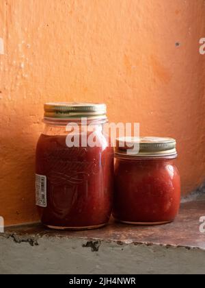 cleaning a raw adriatic cuttlefish at home in Numana, Marche, Italy Stock Photo