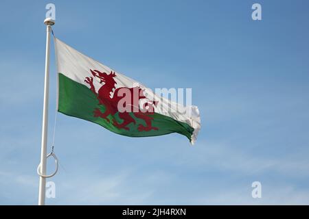 Welsh flag billowing in the wind Stock Photo