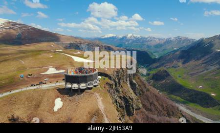 18.05.2022. Gudauri, Georgia. ascending view of Friendship monument and beautiful scenery. High quality photo Stock Photo