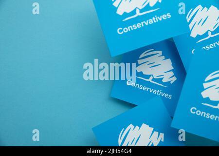 LONDON, UK - July 2022: Conservative United Kingdom political party logo against a blue background Stock Photo