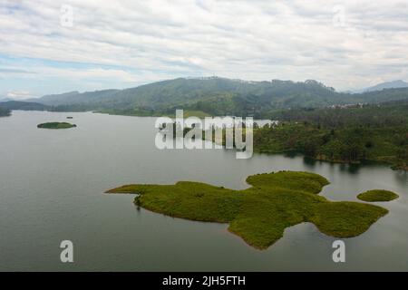 A lake in the mountains among tea estates and plantations Maskeliya, Sri Lanka. Stock Photo