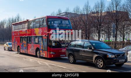 February 21, 2022, Moscow, Russia. Red double-decker sightseeing bus on Tsvetnoy Boulevard in Moscow. Stock Photo