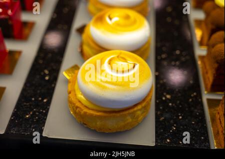 Austrian desserts, different types of chocolate and fruit cakes on display in cafe in Vienna. Stock Photo