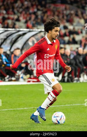 July 15, 2022: MELBOURNE, AUSTRALIA - JULY 15: Zidane Iqbal of Manchester United runs with the ball against Melbourne Victory in a pre-season friendly football match at the MCG on 15th July 2022 (Credit Image: © Chris Putnam/ZUMA Press Wire) Credit: ZUMA Press, Inc./Alamy Live News Stock Photo