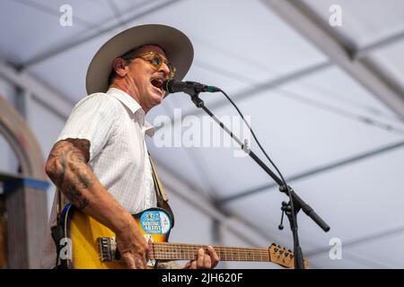 NEW ORLEANS, LA, USA - MAY 2, 2019: Eric Lindell plays guitar and sings in the Blues Tent during the 2019 New Orleans Jazz and Heritage Festival Stock Photo