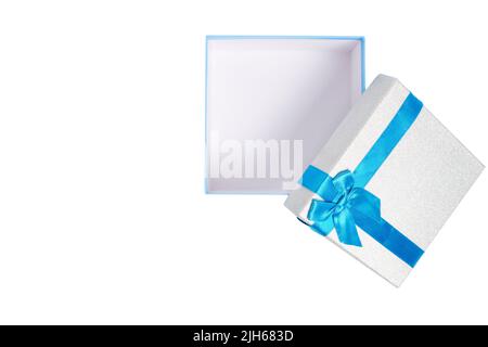 Open gift box with blue ribbon and bow white background Stock Photo