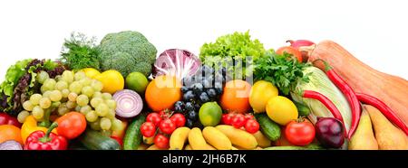 Heap different fruits, vegetables and berries isolated on white background Stock Photo