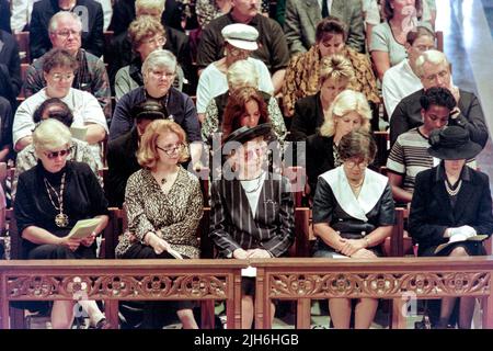 Members of the public gallery listen to the service during a memorial and prayer service to Diana, the Princess of Wales, on the occasion of her death at the Washington National Cathedral, September 6, 1997, in Washington, D.C. Stock Photo