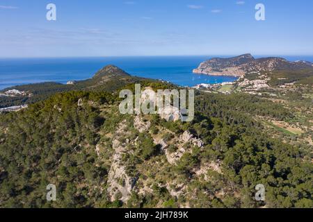 Aerial view of cliffs on top of mountain in Peguera, Mallorca, Spain. Blue sea and Es Camp de Mar in background Stock Photo