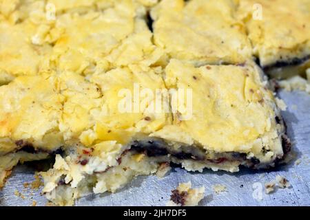 Mashed potatoes stuffed with minced meat in a tray and cooked in the oven, selective focus of potato puree and this recipe cuisine is cooked in many c Stock Photo