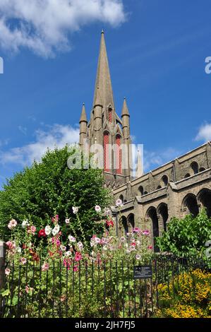 Church of St John the Evangelist in St John's Street, (viewed from Church Row side), Bury St Edmunds, Suffolk, England, UK Stock Photo