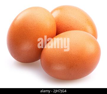 Brown chicken eggs isolated on white background. Stock Photo