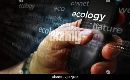 Social media on display with Ecology, environment and climate crisis. Searching on tablet, pad, phone or smartphone screen in hand. Abstract concept o Stock Photo