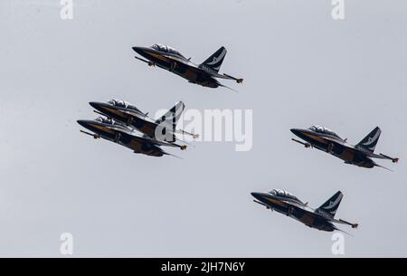 The “Black Eagles” are the current Republic of Korea Air Force aerobatic display team flying eight black, white and gold colored KAI T-50B “Golden Eag Stock Photo