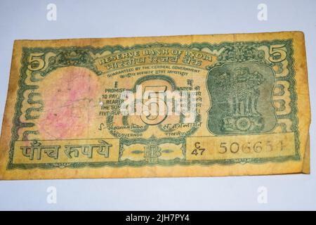 Old Five Rupee notes combined on the table, India money on the rotating ...