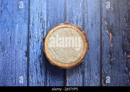 Raw whole dried Quinoa seeds Stock Photo