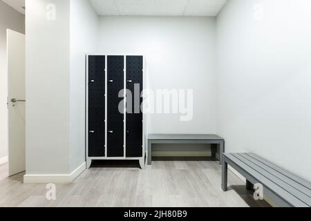 Gym wood interior with black yoga mat, small windows, no people. Copy space  Stock Photo - Alamy