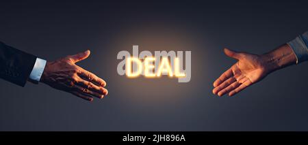 Two men shake hands. Deal concept Stock Photo