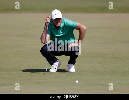 Scottie Scheffler lines up a putt during AT&T Pebble Beach ProAm