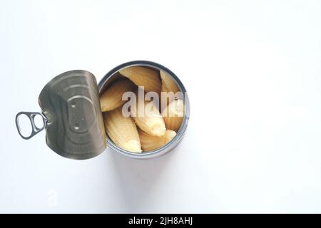baby corn in a tin can container on white background  Stock Photo