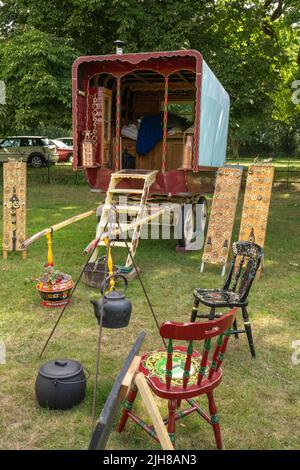 Vintage gypsy caravans that were pulled by horses at Strumpshaw steam museum tree fair in Norfolk Stock Photo