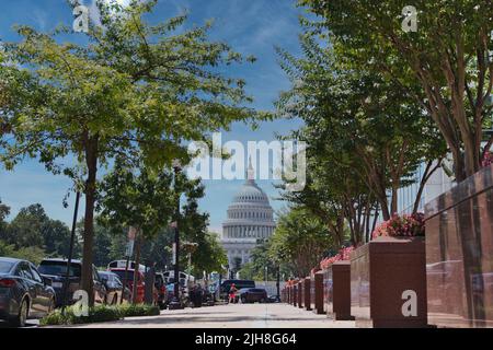 The United States Capitol building on the end of the street Stock Photo