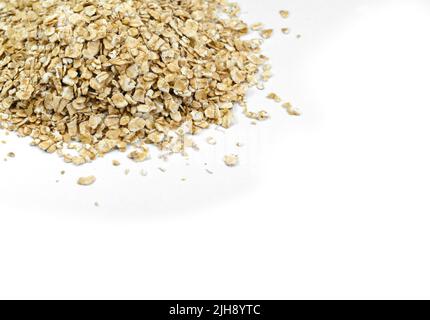 oat flakes isolated on white background. Stock Photo