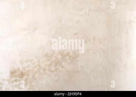 White lime washed wall plaster with damp stains, grunge background Stock Photo