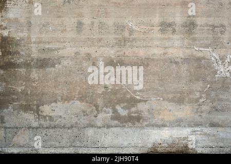 Raw concrete formwork wall with wood impression, grunge texture Stock Photo