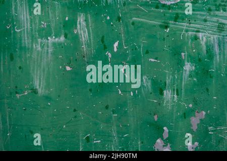 Green painted old metal sheet grunge background Stock Photo