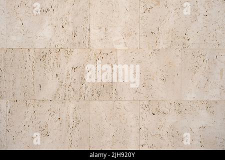 Classic cladding  wall slabs with textured travertine stone finish impression Stock Photo