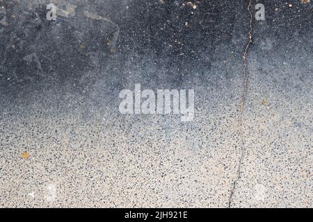 Old cracked ceramic tile with stone finish Stock Photo