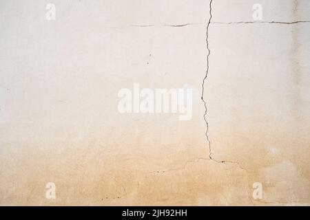 Crack on old lime washed wall Stock Photo