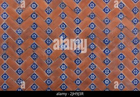 traditional mexican red wall adornments of handmade hand painted talavera poblana tiles in Atlixco, Puebla, Mexico Stock Photo