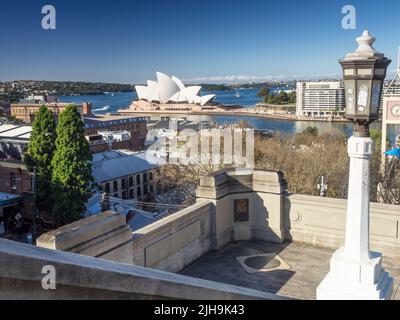 The Sydney Opera House on Bennelong Point and Port Jackson from the Bridge Stairs in The Rocks. Stock Photo