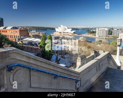 The Sydney Opera House on Bennelong Point and Port Jackson from the Bridge Stairs in The Rocks. Stock Photo