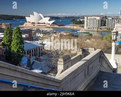 The Sydney Opera House on Bennelong Point and Port Jackson from the Bridge Stairs in The Rocks. Stock Photo