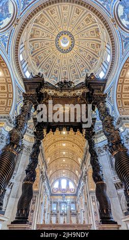 A vertical low angle shot of the Papal Basilica of Saint Peter in the Vatican interior Stock Photo