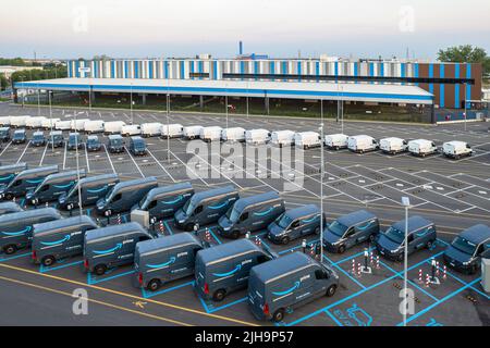 Top view of Amazon Prime electric delivery vans, parked at  the logistics hub of Amazon. Turin, Italy - July 2022 Stock Photo