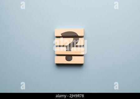 Question mark concept or FAQ. Sign on wooden blocks. Stock Photo