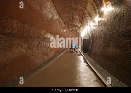 Niagara Falls, Ontario, Canada - July 2022: A tunnel 800 metres long, constructed about 1900, formerly used to discharge water from a hydro-electric p Stock Photo