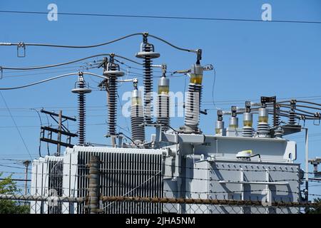 Electric power transformer at transmission substation Stock Photo