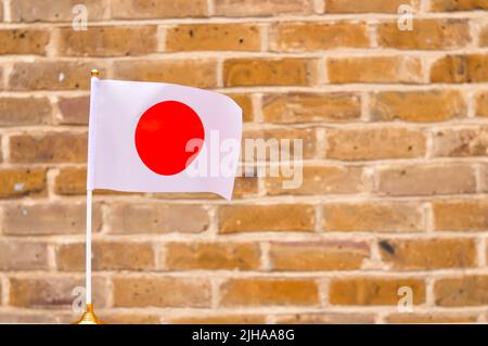 Close up of national flag of Japan round red circle on white background Stock Photo