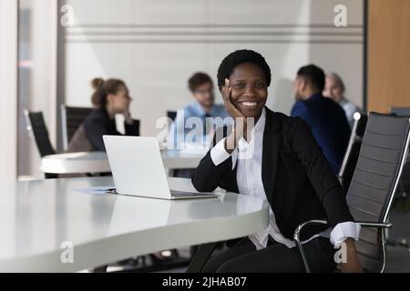 Happy young African American business woman corporate portrait Stock Photo