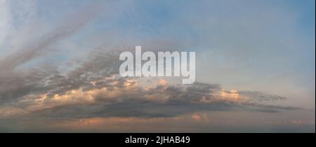 Fantastic soft thunderclouds at sunrise, natural composition Stock Photo